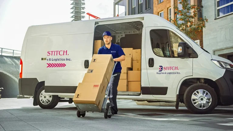 delivery-man-pushes-hand-truck-trolley